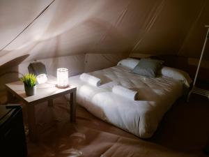 A bed or beds in a room at Glamping Atlántico