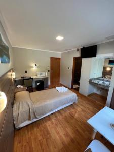 a bedroom with a large bed in a room at Hotel Rincon Del Este in General Deheza +28 photos