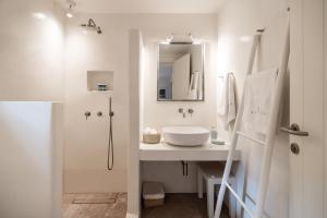 Um banheiro em Ammoa Beach Residences