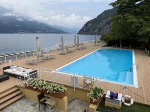 a large swimming pool on the deck of a cruise ship at Sunset House Perledo in Perledo