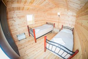 Voodi või voodid majutusasutuse Obora camping toas