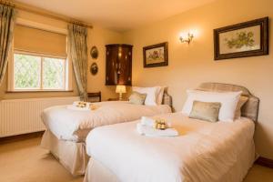Un ou plusieurs lits dans un hébergement de l'établissement Traditional English country 4 bed cottage near Chester - For 7 people