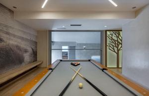 a billiard room with a pool table in it at Artisan's House in Sitia
