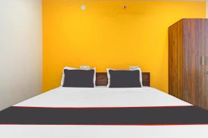 Cama ou camas em um quarto em Collection O 81261 Lexus Guest Inn