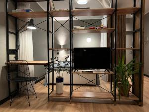 Grey studio in Maarduにあるテレビまたはエンターテインメントセンター