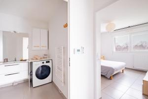 Łóżko lub łóżka w pokoju w obiekcie Appartement T2 neuf - Grande Terrasse de 25m2