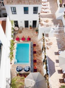 an aerial view of a hotel with a swimming pool at Casa Rosa Villa with Pool in Olhao Centre in Olhão