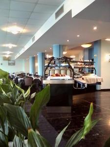 ห้องอาหารหรือที่รับประทานอาหารของ Hotel Caravelle&MiniCaravelle