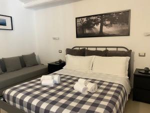 Postel nebo postele na pokoji v ubytování B&B Agriturismo 'A Cunziria