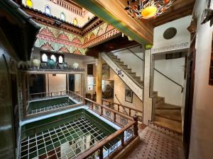 an overhead view of a staircase in a building at Museum House - Dar Melyani in Fez