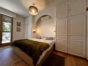 Lova arba lovos apgyvendinimo įstaigoje Charmant appartement Proche plage 4P avec jardin