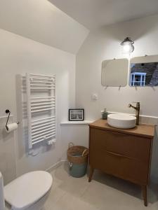 Ванна кімната в Maison de caractère, centre ville historique