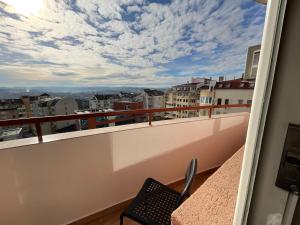 a balcony with a view of a city at Nataly Homes 2 in Veliko Tŭrnovo