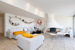 a living room with white furniture and a fireplace at HSUD0085-Sansovino in Cannes