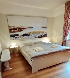 Katil atau katil-katil dalam bilik di "Haus Seegang" für Naturliebhaber, strandnah, ruhig, mit großem Garten