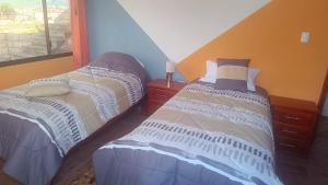 Postel nebo postele na pokoji v ubytování LULU HOUSE