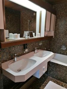 Koupelna v ubytování Hotel Garni Tannleger B&B