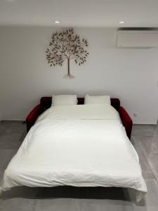 Ένα ή περισσότερα κρεβάτια σε δωμάτιο στο Logement design entier neuf à Paris Gentilly
