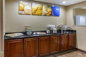 a kitchen with a counter with food on it at Comfort Inn Greensboro - Kernersville in Greensboro