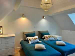 Posteľ alebo postele v izbe v ubytovaní Gîte Les Hauts de Boulogne