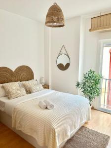 Postel nebo postele na pokoji v ubytování Apartment Rosario in Malaga center