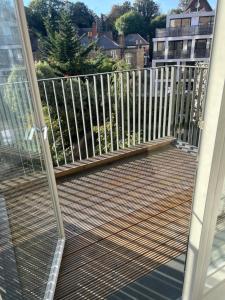 a balcony with a fence on a house at Remarkable 1-Bed Apartment in London with balcony in London