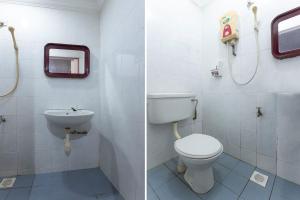 a bathroom with a toilet and a sink at Apollo Hotel Johor Bharu in Johor Bahru