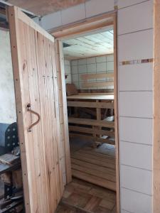 Palanda nebo palandy na pokoji v ubytování Guest House SAMSON