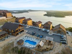 an aerial view of a house with a pool at Laketopia Lodge in Kimberling City