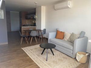 Posezení v ubytování Modernos departamentos tipo LOFT a dos calles del estadio