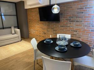 Posezení v ubytování Modernos departamentos tipo LOFT a dos calles del estadio