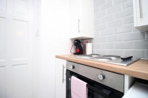Η κουζίνα ή μικρή κουζίνα στο Bristol Street (2BR FREE parking)| Cohost Partners +33 φωτογραφίες