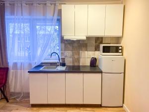 Kuchyňa alebo kuchynka v ubytovaní Mokka Apartament
