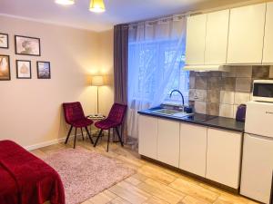 Kuchyňa alebo kuchynka v ubytovaní Mokka Apartament