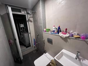 A bathroom at Lodha 1 bhk property Thane with parking