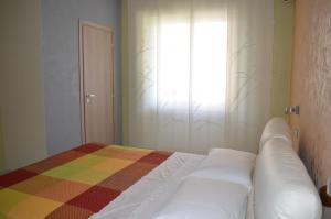 Postel nebo postele na pokoji v ubytování Casa Aurora B&B