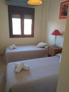 Ένα ή περισσότερα κρεβάτια σε δωμάτιο στο EL MIRADOR DE LA DUQUESA +7 φωτογραφίες