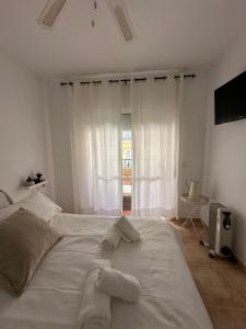Postel nebo postele na pokoji v ubytování Tiyoweh + 23 fotografií