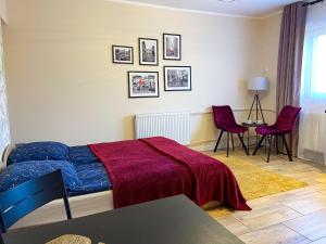 Posteľ alebo postele v izbe v ubytovaní Mokka Apartament