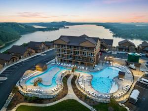 an aerial view of a resort with a large swimming pool at Sunset Bluff at Table Rock Lake in Kimberling City