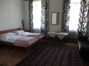 Postel nebo postele na pokoji v ubytování Hotel Stadtpark