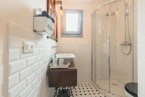 a bathroom with a shower and a sink at B&B Antico Telaio in Santa Maria Navarrese