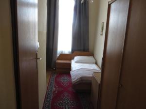 Postel nebo postele na pokoji v ubytování Hotel Stadtpark