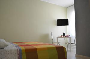 TV a/nebo společenská místnost v ubytování Casa Aurora B&B