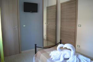 Postel nebo postele na pokoji v ubytování Casa Aurora B&B
