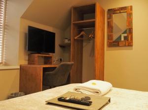 TV a/nebo společenská místnost v ubytování Argyll Hotel