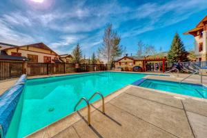 a swimming pool in the middle of a house at EagleRidge Lodge and Townhomes in Steamboat Springs