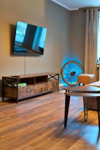 TV a/nebo společenská místnost v ubytování Industrial Style 77qm mit Balkon