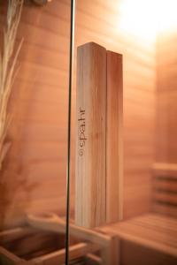 a wooden block sitting on top of a sauna at Kuća za odmor Mali raj-Kupres in Kupres