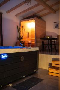 a room with a pool table and a dining room at Kuća za odmor Mali raj-Kupres in Kupres